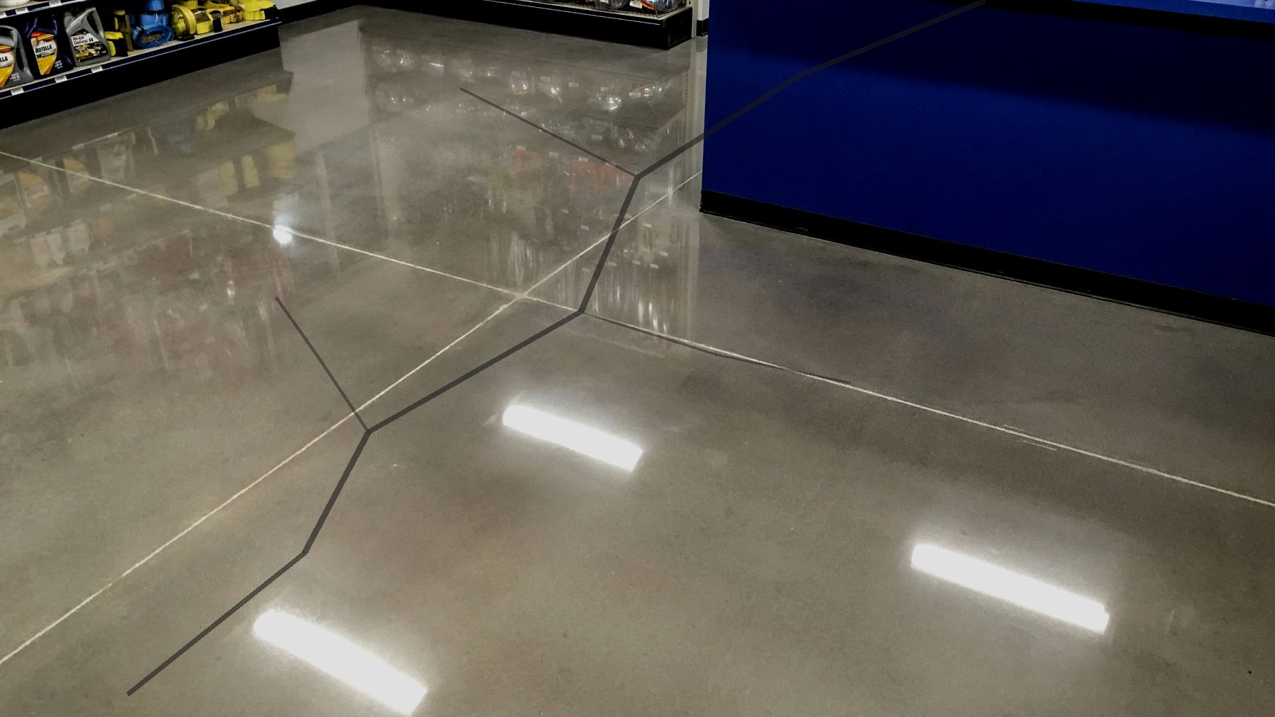 Concrete floor texture showing repair and resurfacing needs