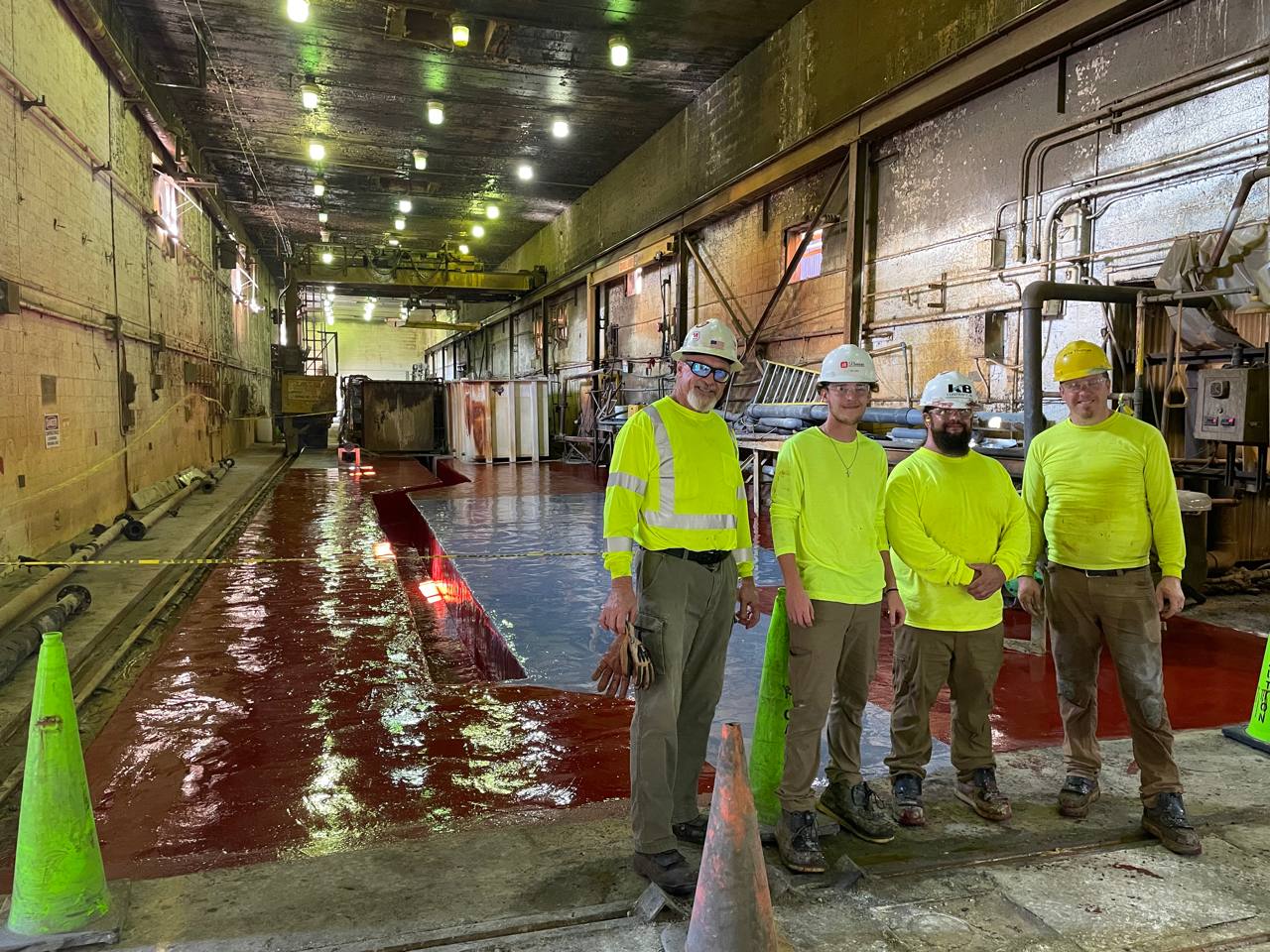 KB Coatings crew standing at the completed Liberty Steel floor repair area